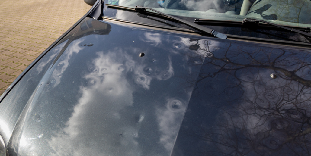 A Guide to Automotive Hail Damage Repair: DIY vs. Auto Body Shops