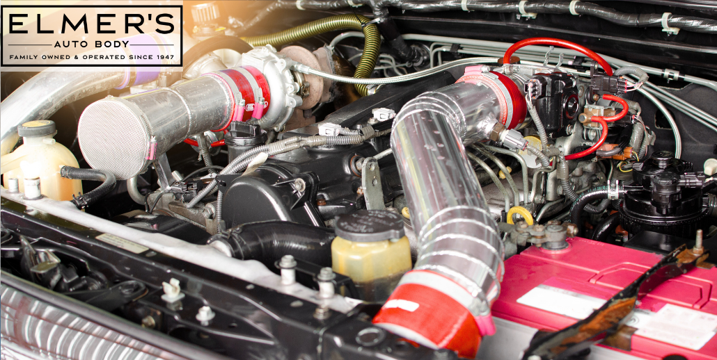 An image of a car engine with OEM safety components installed correctly