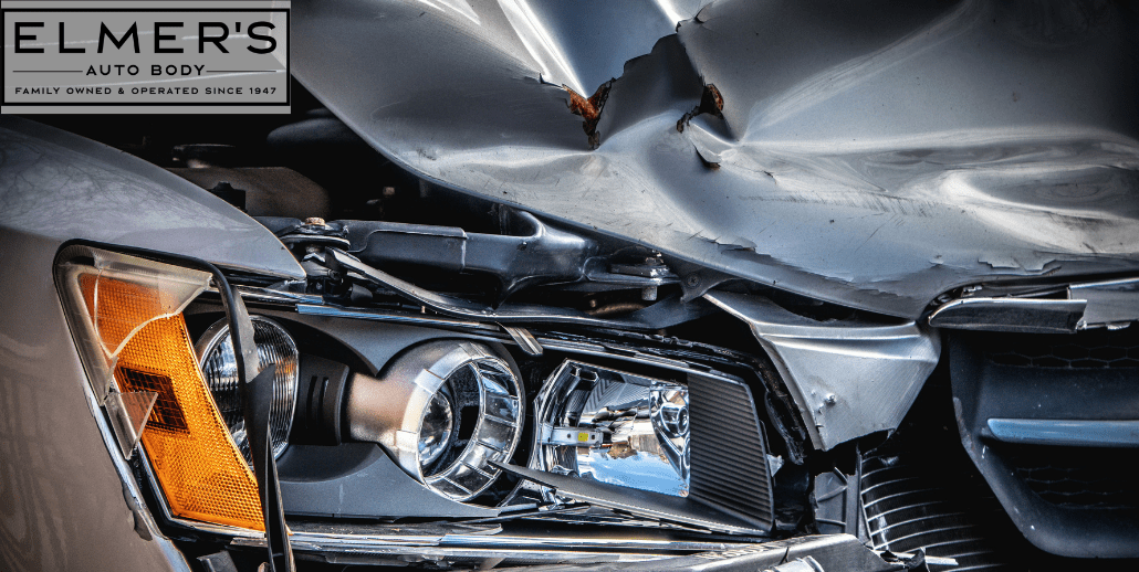 A car in need of structural repairs that will need to be closely measured.